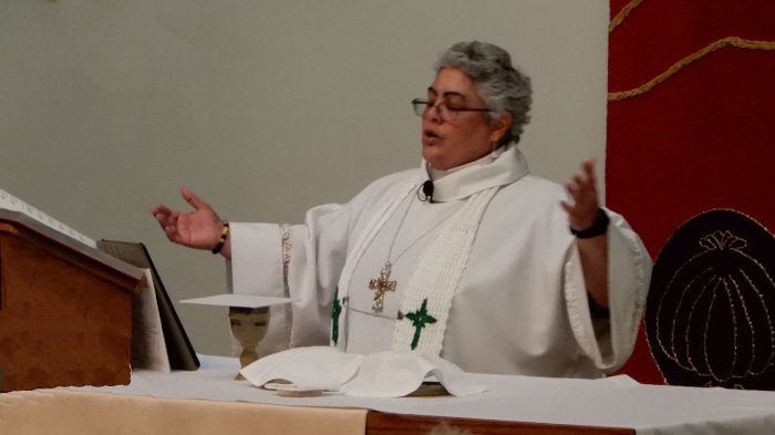 Pastor Rosy at Altar